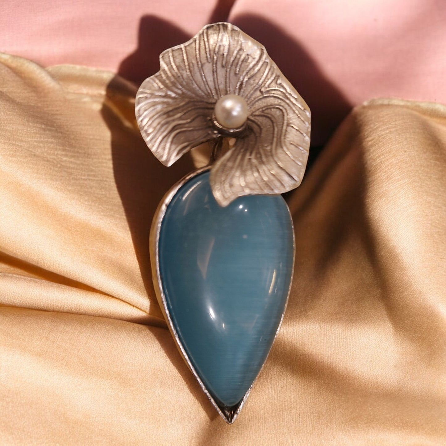 CONTEMPORARY SILVER PETAL AND BLUE STONES FLOWER EARRINGS
