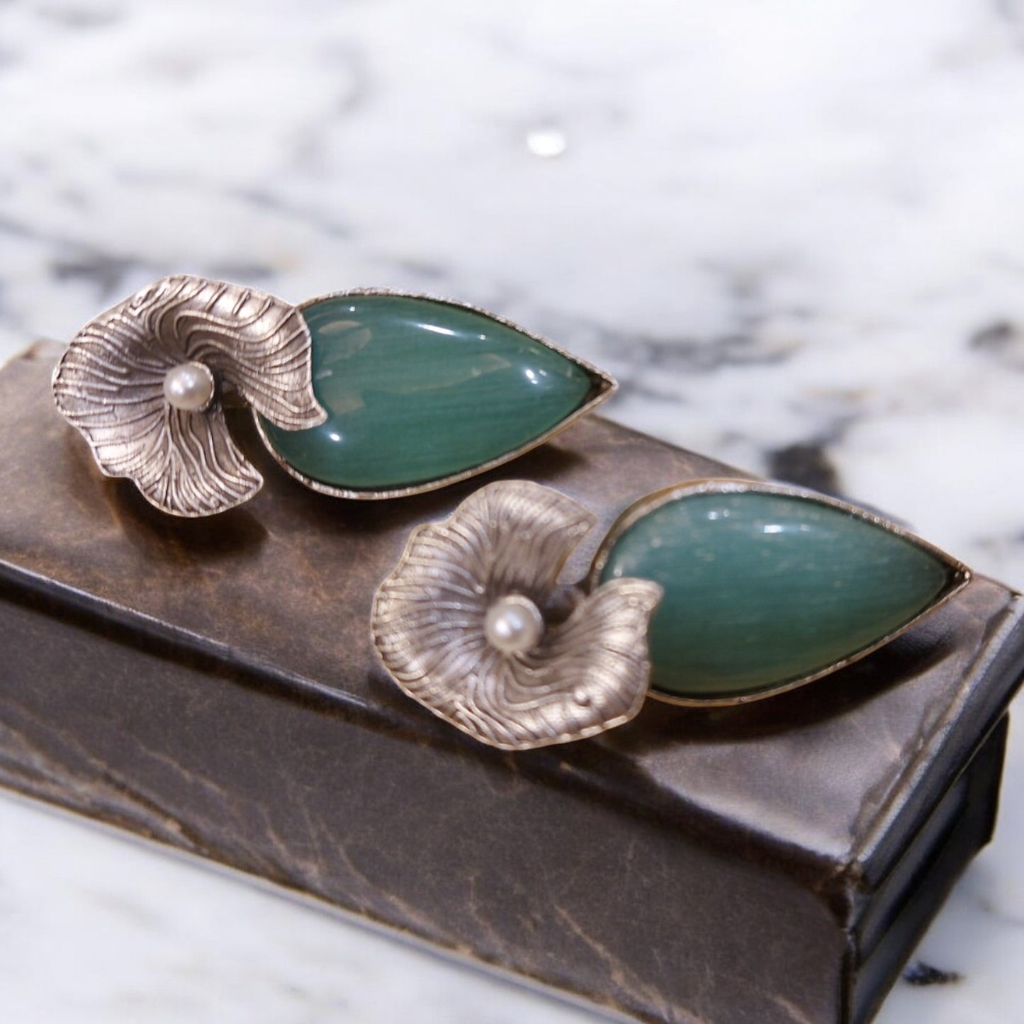 CONTEMPORARY SILVER PETAL AND MINT GREEN STONES FLOWER EARRINGS