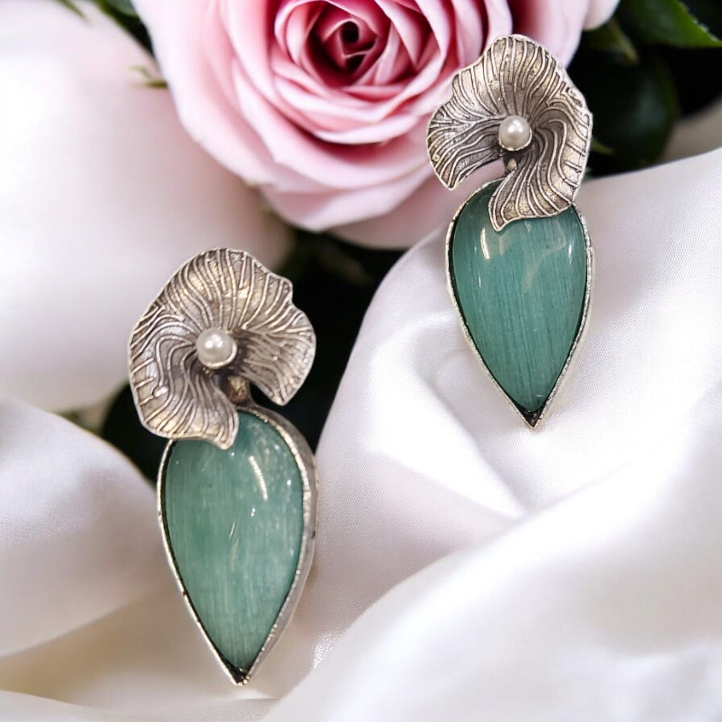 CONTEMPORARY SILVER PETAL AND MINT GREEN STONES FLOWER EARRINGS