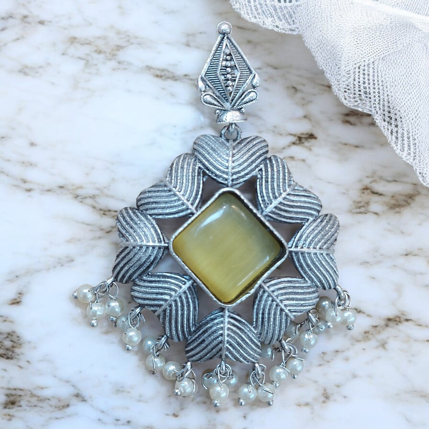 SILVER HEART SHAPED YELLOW MONALISA STONE EARRING WITH PEARL GHUNGROO